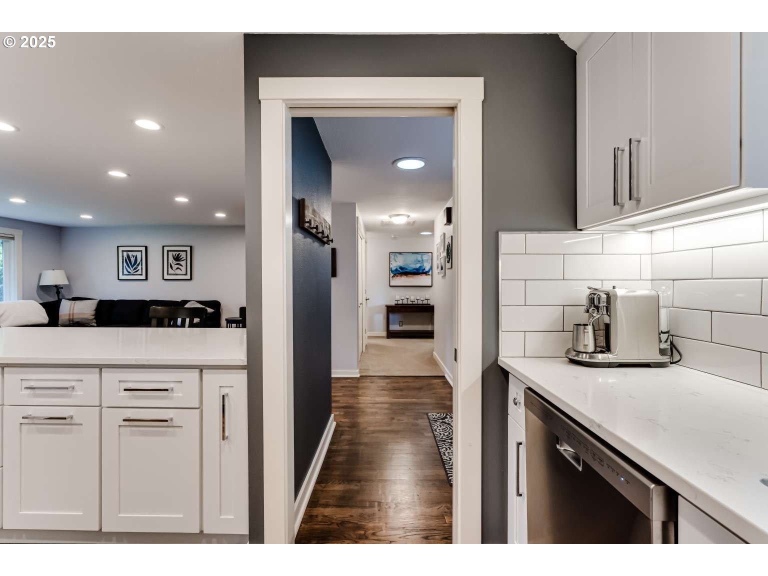 1253 Alfaretta Drive Eugene, OR 97401 - Photo 11 of 33 a kitchen with kitchen island a sink appliances and cabinets