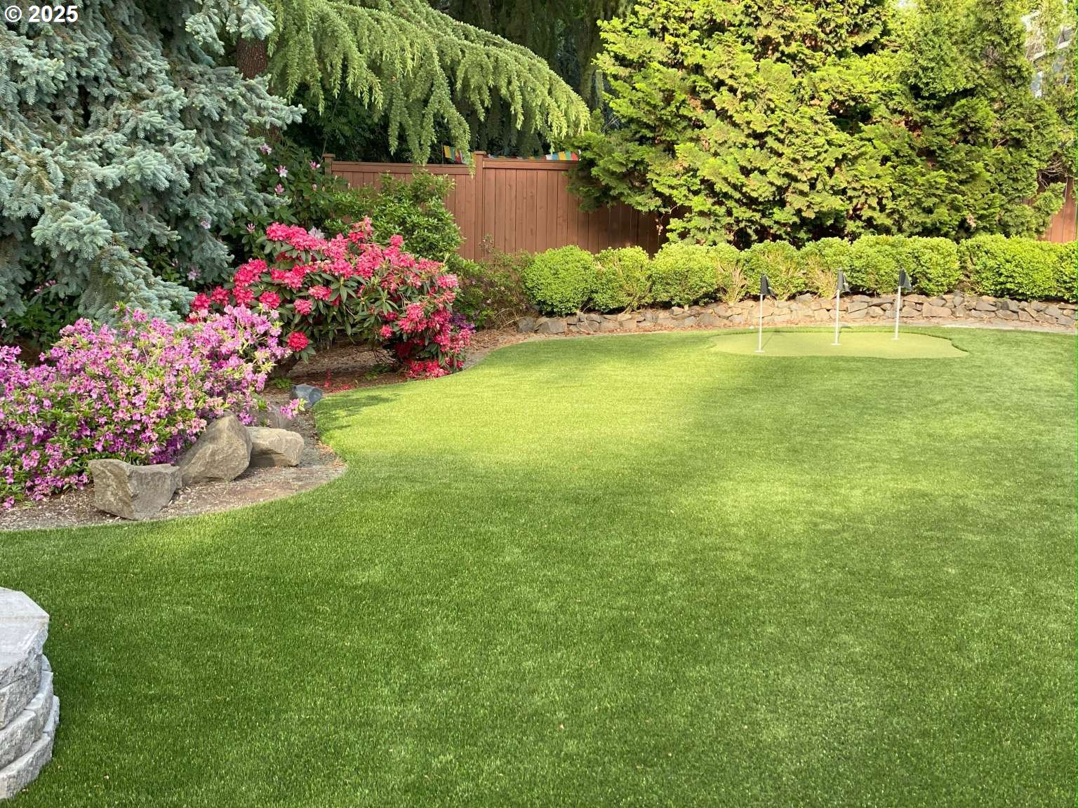 1253 Alfaretta Drive Eugene, OR 97401 - Photo 30 of 33 a view of a garden and flowers