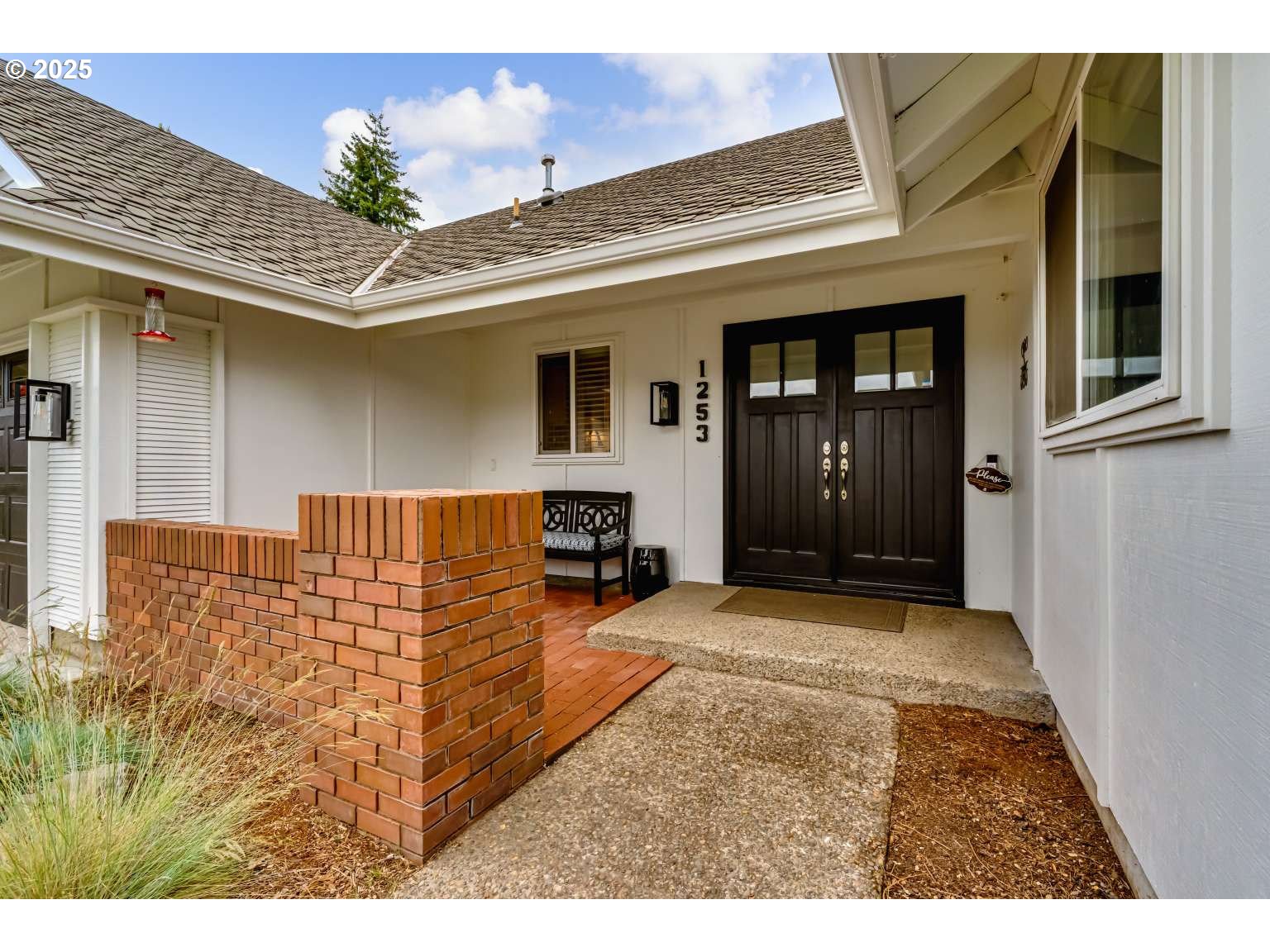 1253 Alfaretta Drive Eugene, OR 97401 - Photo 4 of 33 a view of a porch with a table and chair