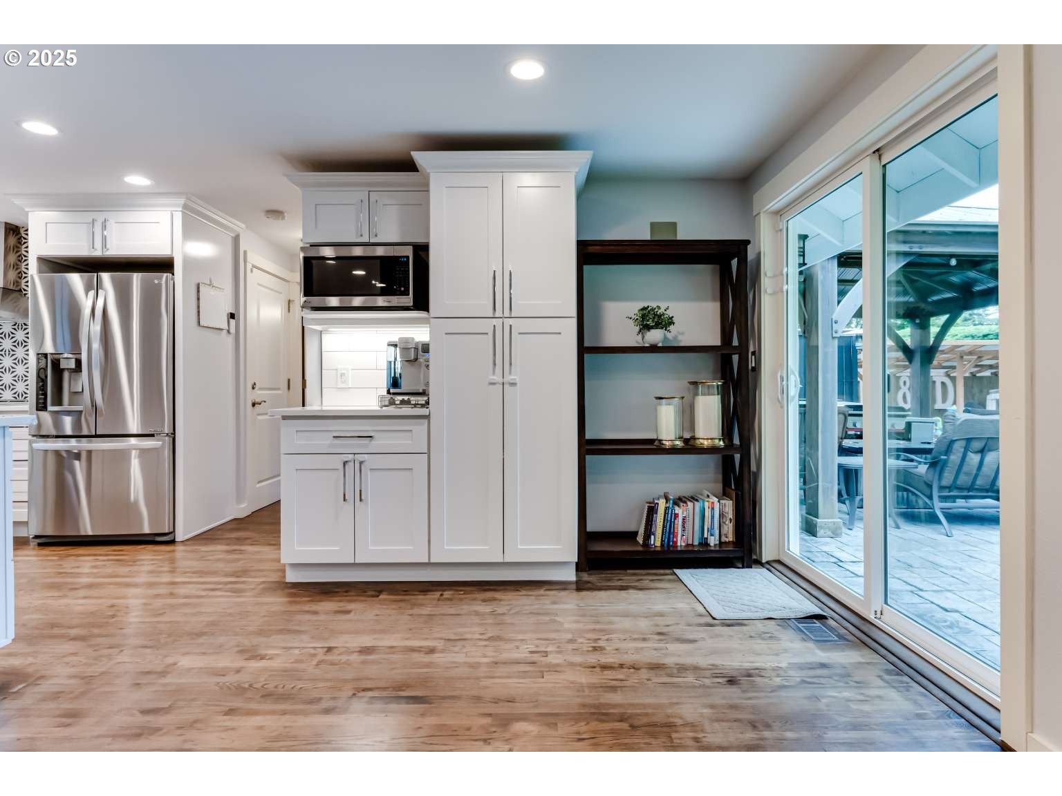 1253 Alfaretta Drive Eugene, OR 97401 - Photo 6 of 33 a kitchen with stainless steel appliances granite countertop a refrigerator and a stove
