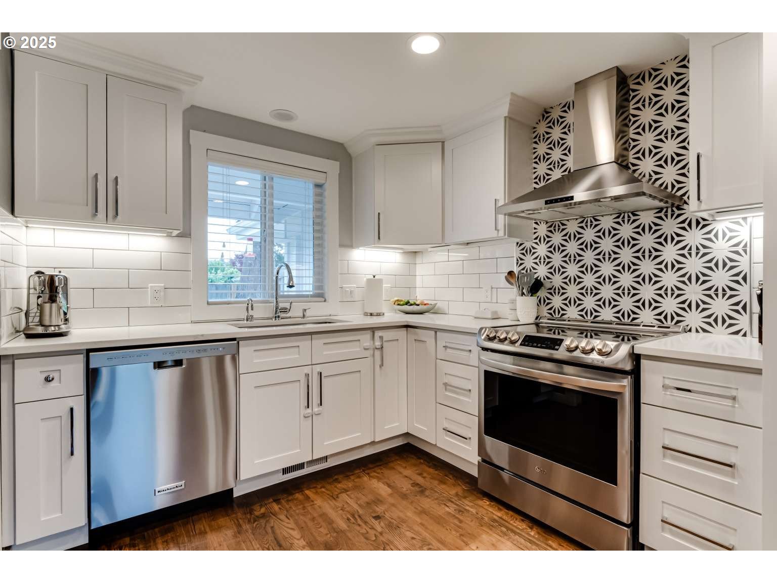 1253 Alfaretta Drive Eugene, OR 97401 - Photo 8 of 33 a kitchen with stainless steel appliances granite countertop a stove a sink and a microwave
