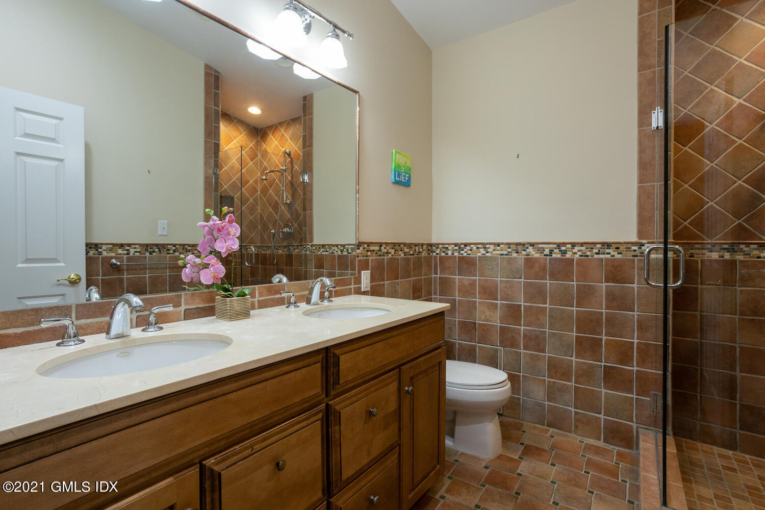 89 Florence Road Riverside, CT 06878 - Photo 15 of 34 a bathroom with a sink mirror toilet and shower