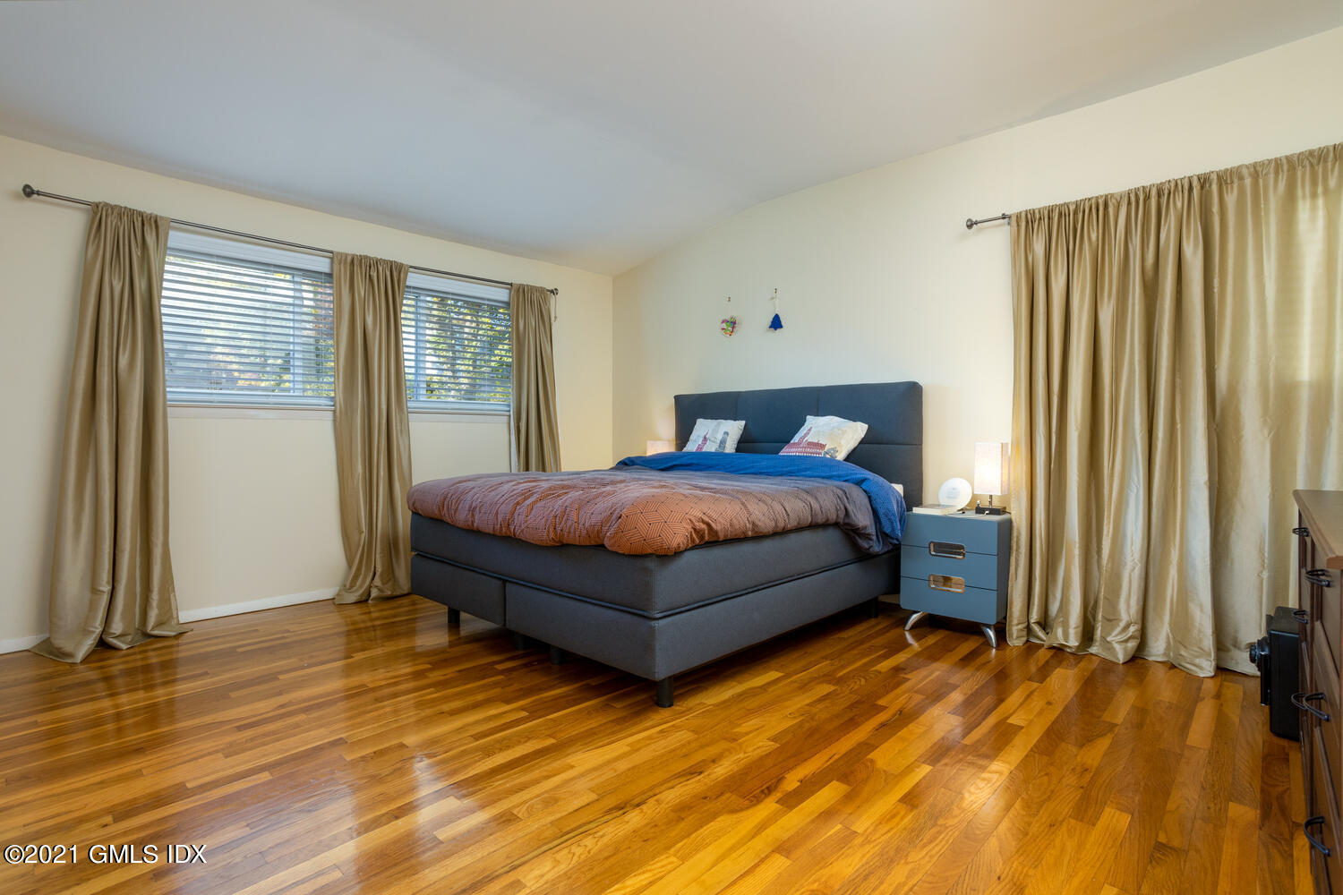 89 Florence Road Riverside, CT 06878 - Photo 17 of 34 a bedroom with a bed and window