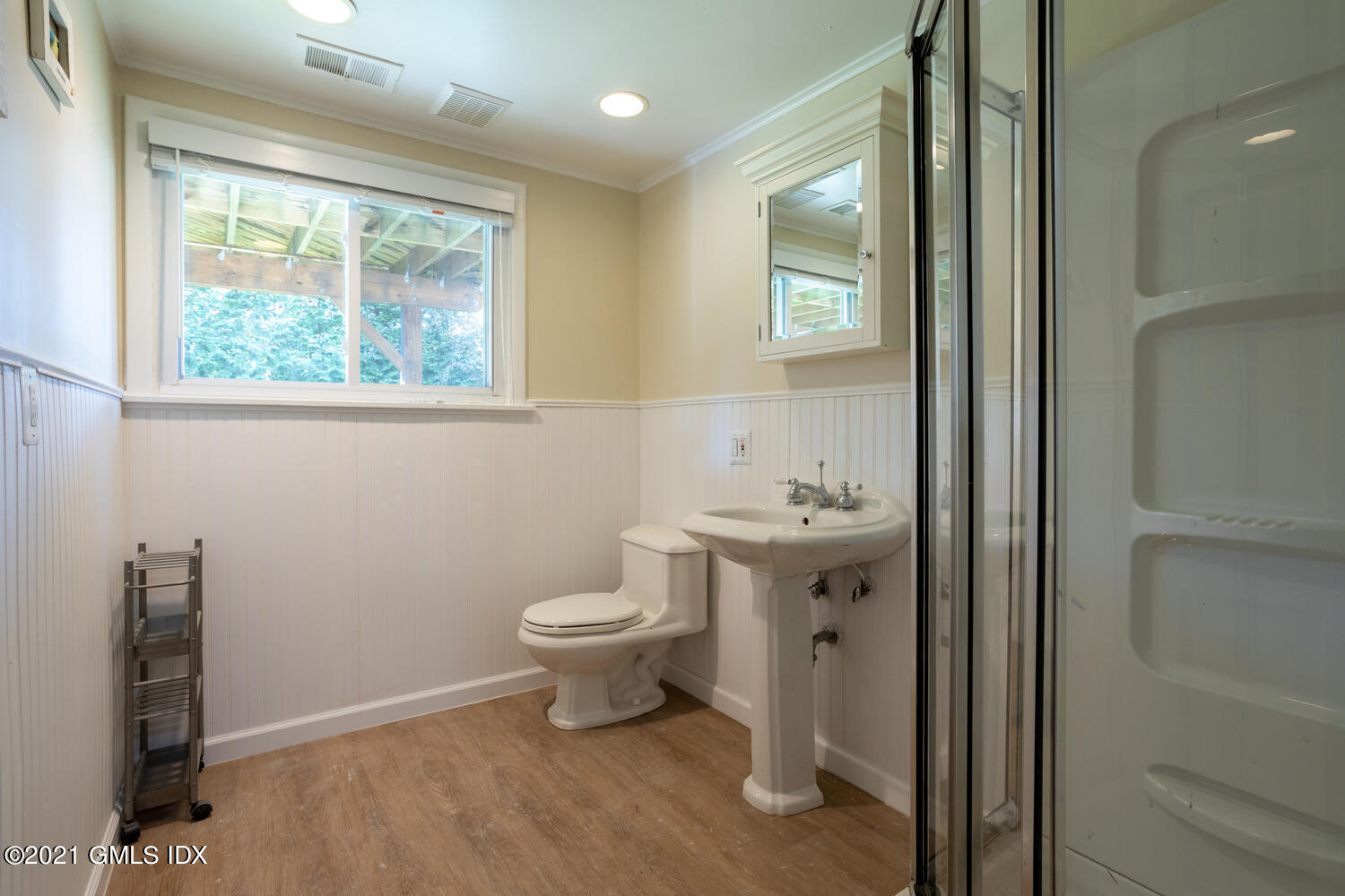 89 Florence Road Riverside, CT 06878 - Photo 23 of 34 a bathroom with a toilet sink and mirror