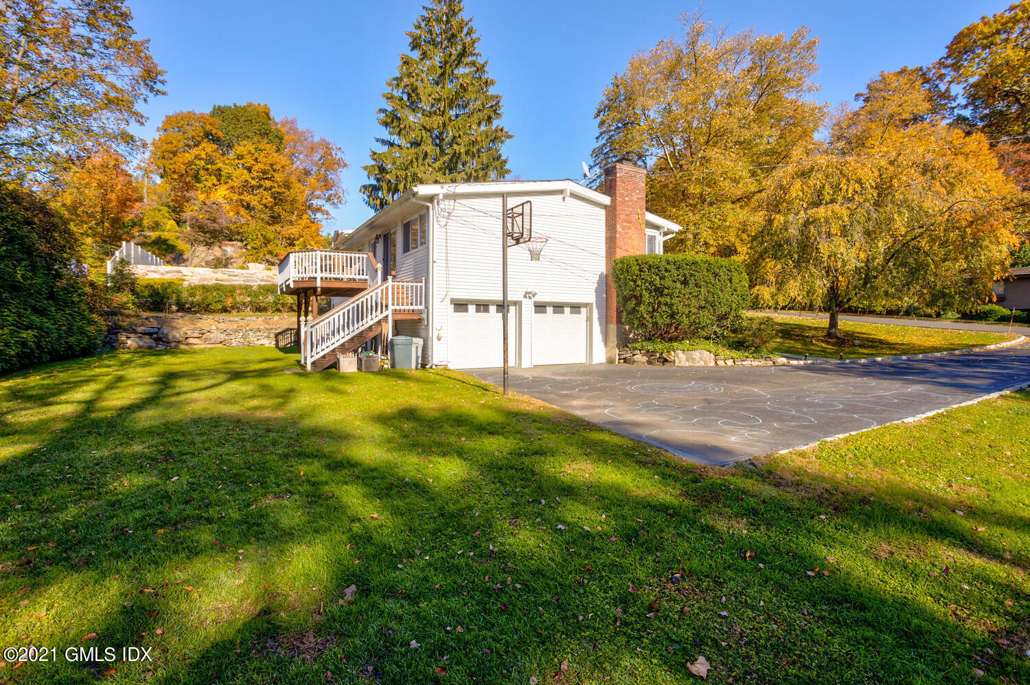 89 Florence Road Riverside, CT 06878 - Photo 25 of 34 a view of backyard with large trees