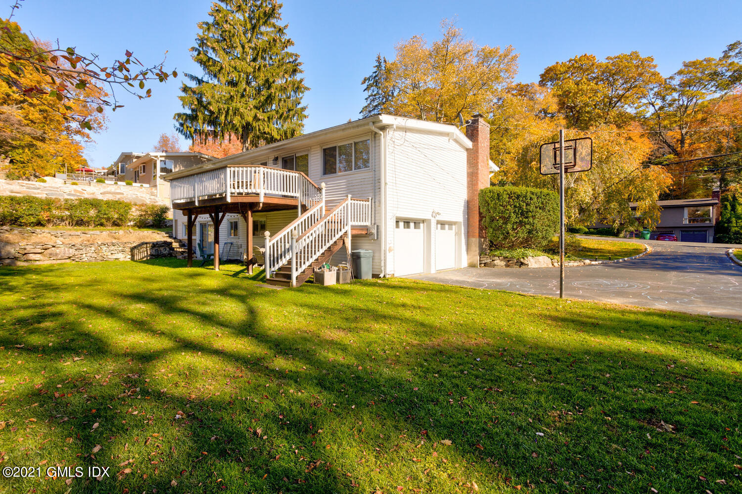 89 Florence Road Riverside, CT 06878 - Photo 26 of 34 a view of a house with pool and a yard