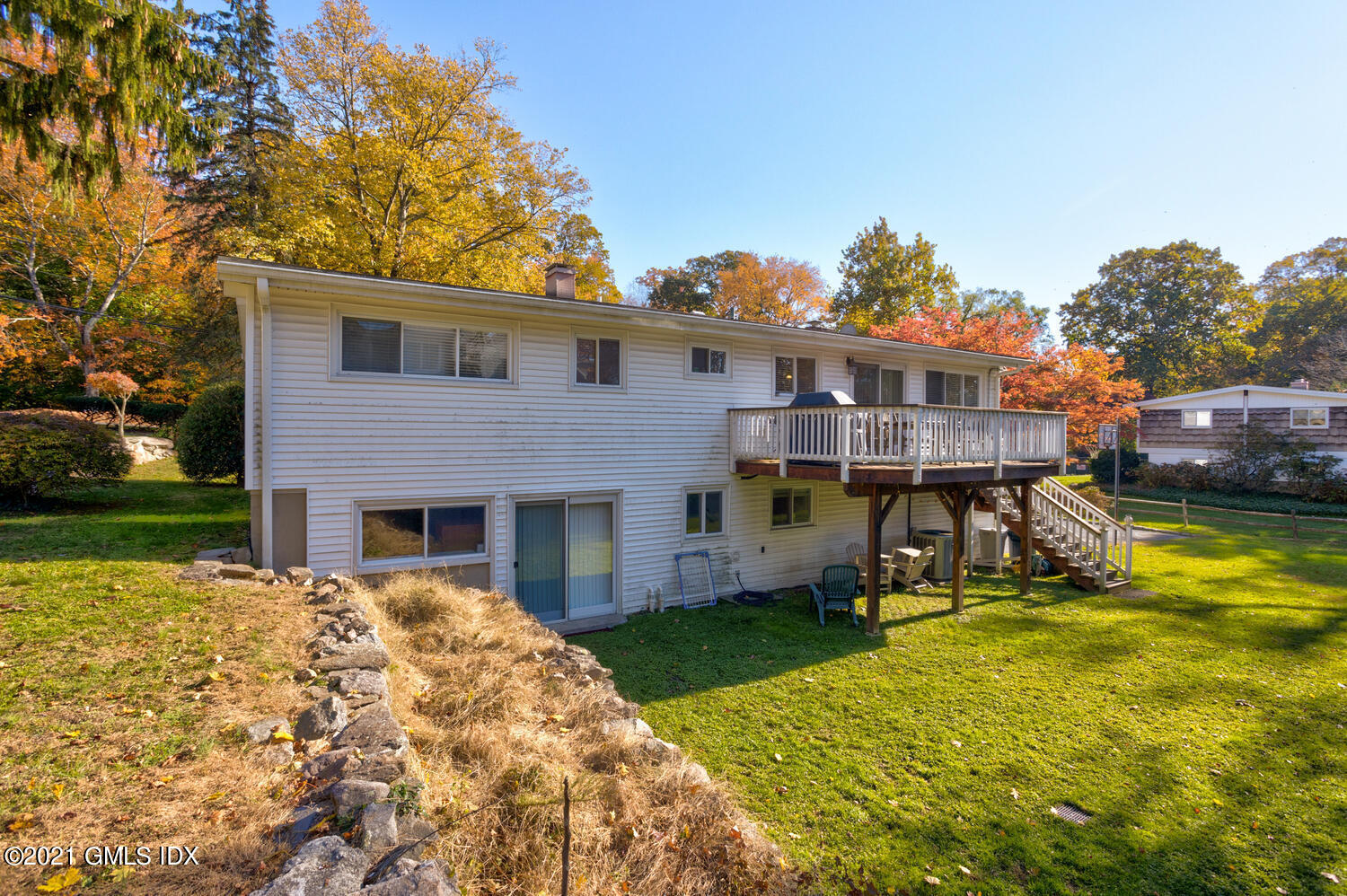 89 Florence Road Riverside, CT 06878 - Photo 29 of 34 a front view of a house with a yard