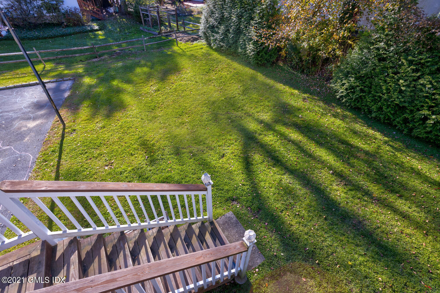 89 Florence Road Riverside, CT 06878 - Photo 32 of 34 a view of a swimming pool with a garden