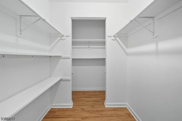 a view of an empty walk in closet