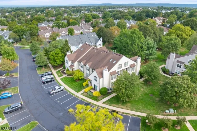 an aerial view of a house with a garden