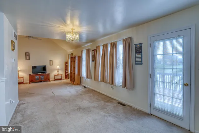 a view of a livingroom with a staircase