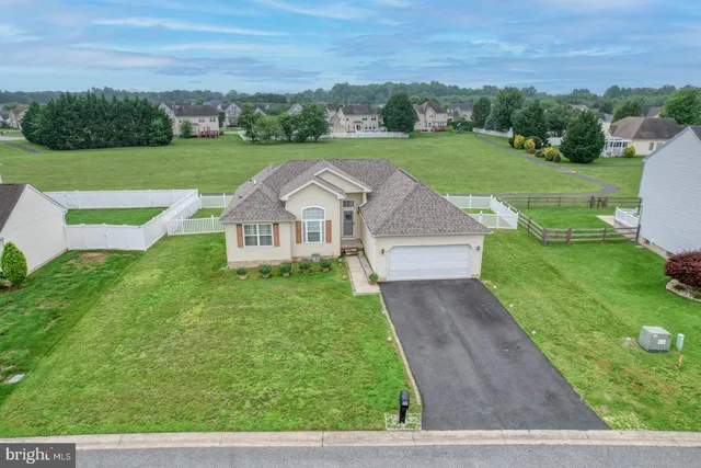 a view of a garden with houses