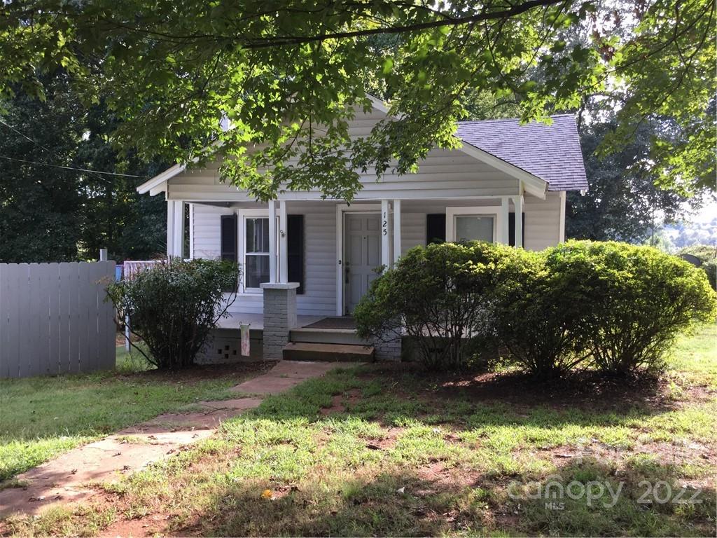 125 John Smith Road Rutherfordton, NC 28139 - Photo 1 of 13 a front view of a house with a yard
