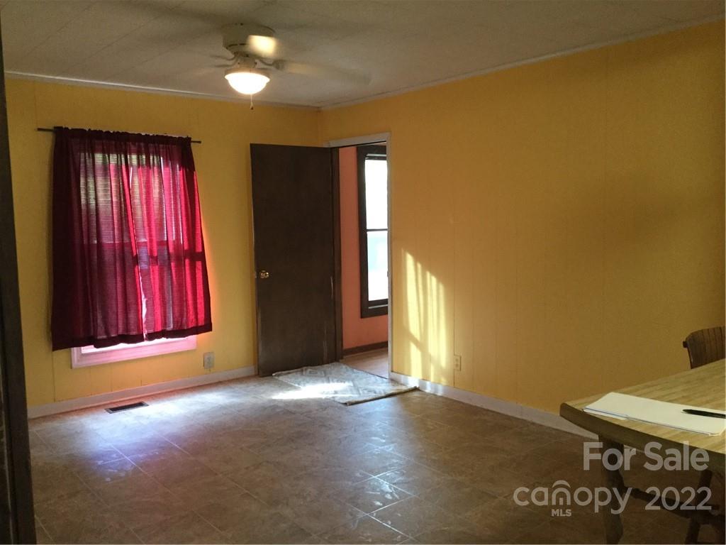125 John Smith Road Rutherfordton, NC 28139 - Photo 11 of 13 an empty room with windows