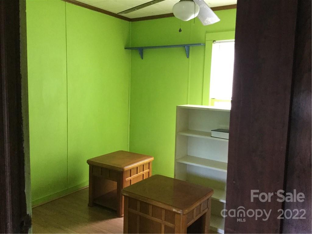 125 John Smith Road Rutherfordton, NC 28139 - Photo 12 of 13 a room with a table and a fireplace
