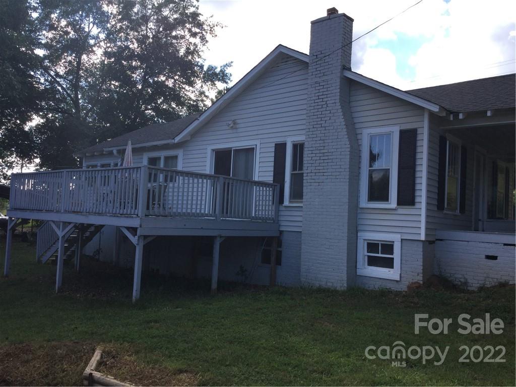 125 John Smith Road Rutherfordton, NC 28139 - Photo 3 of 13 a backyard of a house with table and chairs
