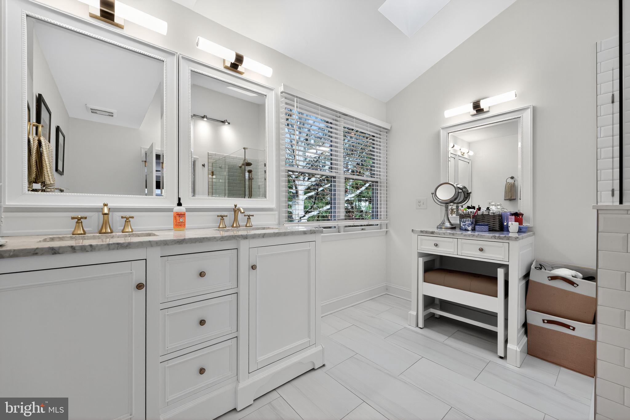 39 Bramley Road Moorestown, NJ 08057 - Photo 17 of 28 a bathroom with sink mirror and