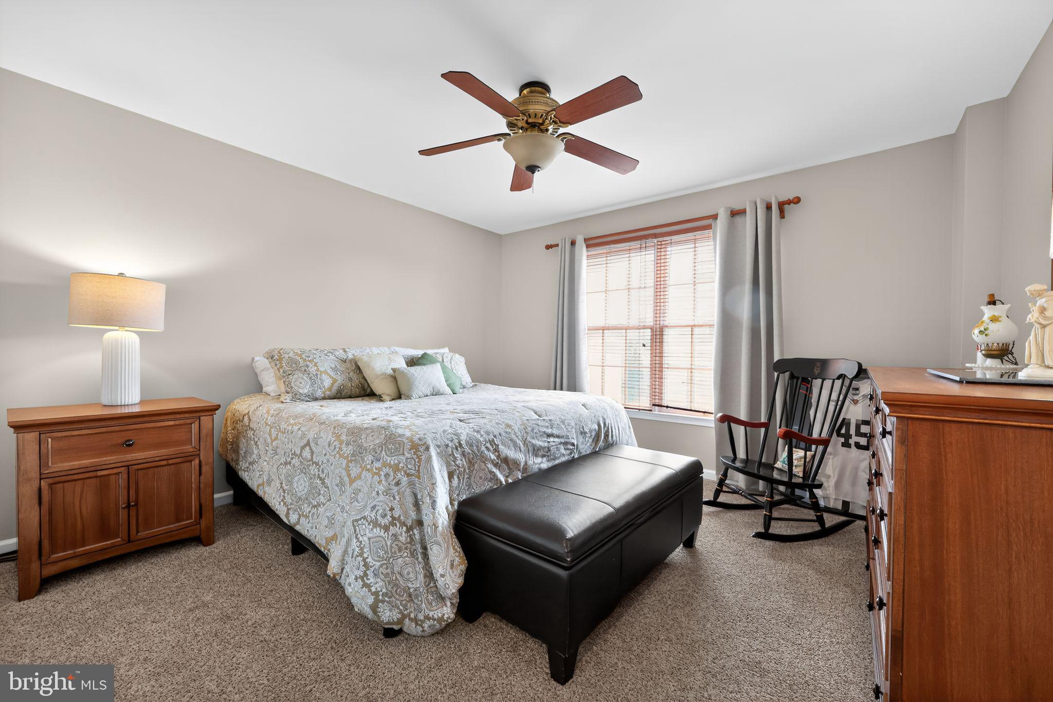 39 Bramley Road Moorestown, NJ 08057 - Photo 20 of 28 a spacious bedroom with a bed and window