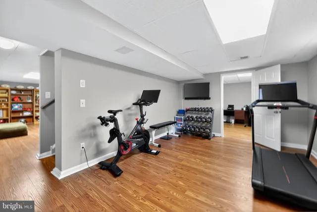 a room with furniture and a flat screen tv
