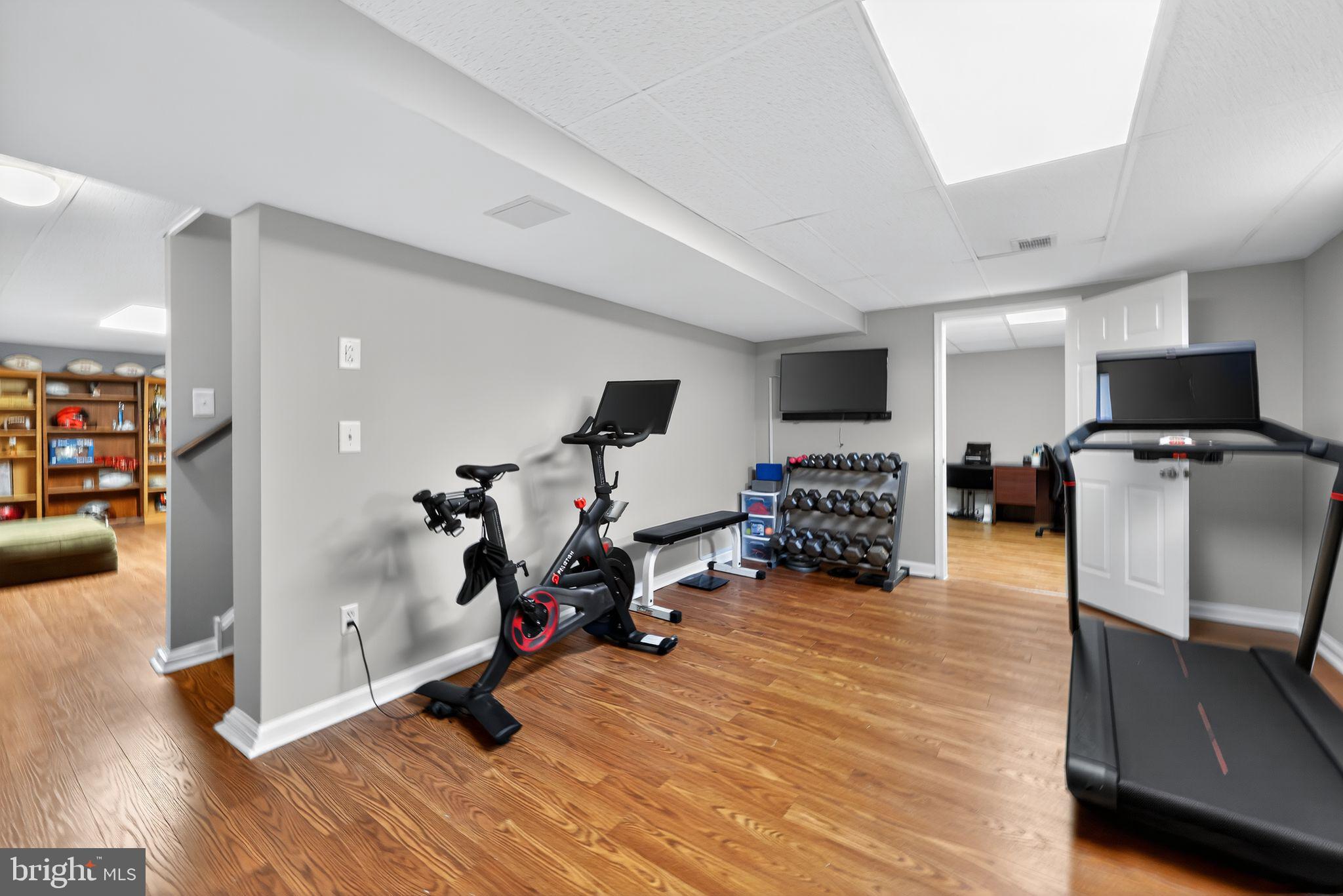 39 Bramley Road Moorestown, NJ 08057 - Photo 25 of 28 a room with furniture and a flat screen tv