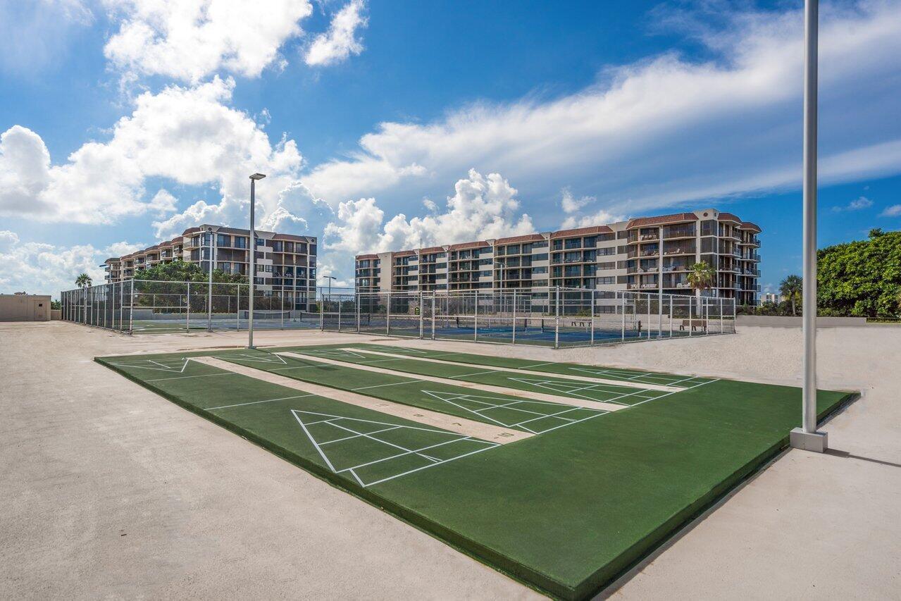 899 Jeffery Street, Unit 3050 Boca Raton, FL 33487 - Photo 24 of 31 a view of a tennis court