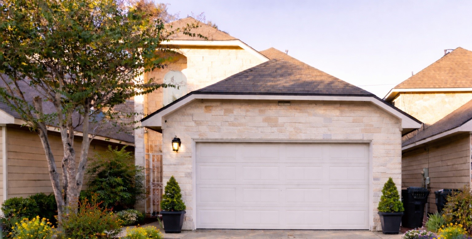 a view of a house with a garage