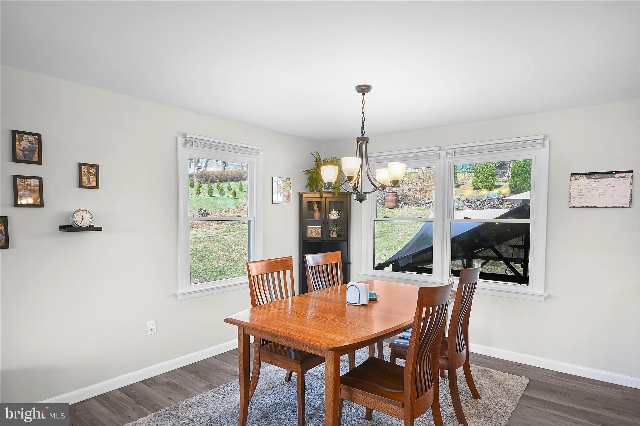 668 Scotland Road Quarryville, PA 17566 - Photo 11 of 41 a view of a dining room with furniture window and wooden floor