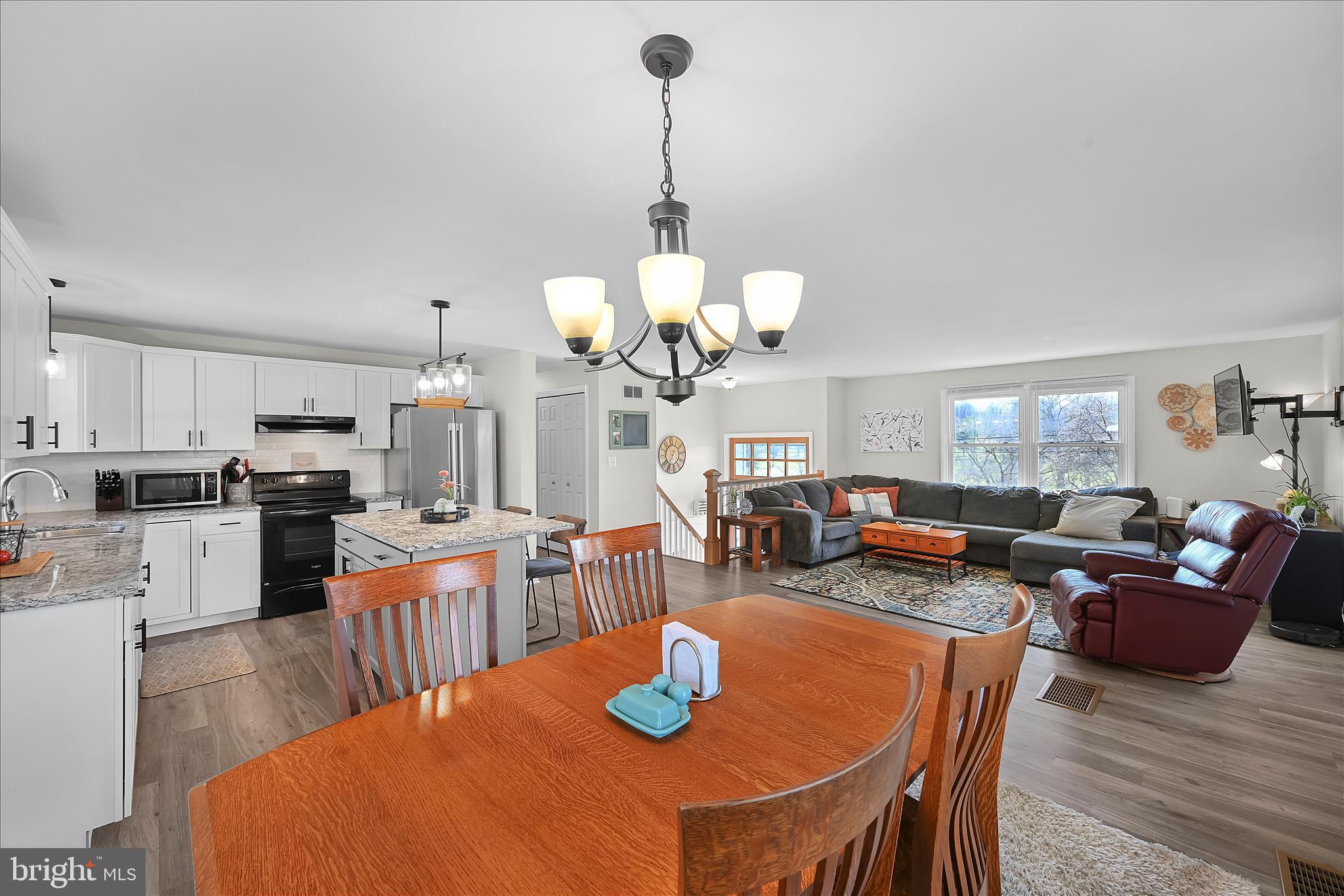 668 Scotland Road Quarryville, PA 17566 - Photo 12 of 41 a view of a dining room with furniture and wooden floor