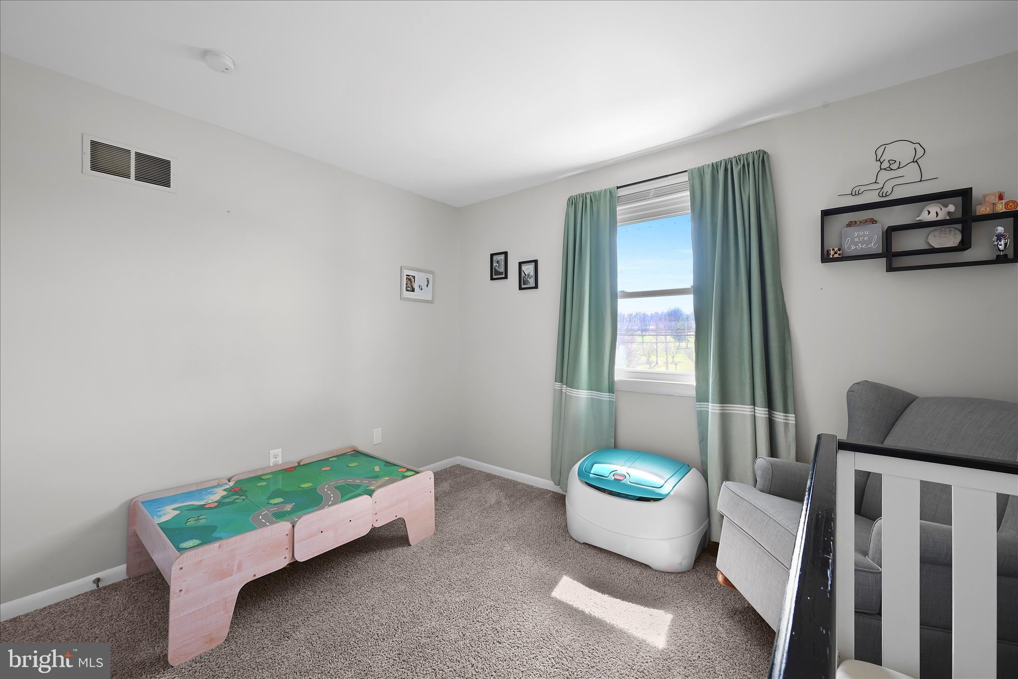 668 Scotland Road Quarryville, PA 17566 - Photo 25 of 41 a room with furniture and a window