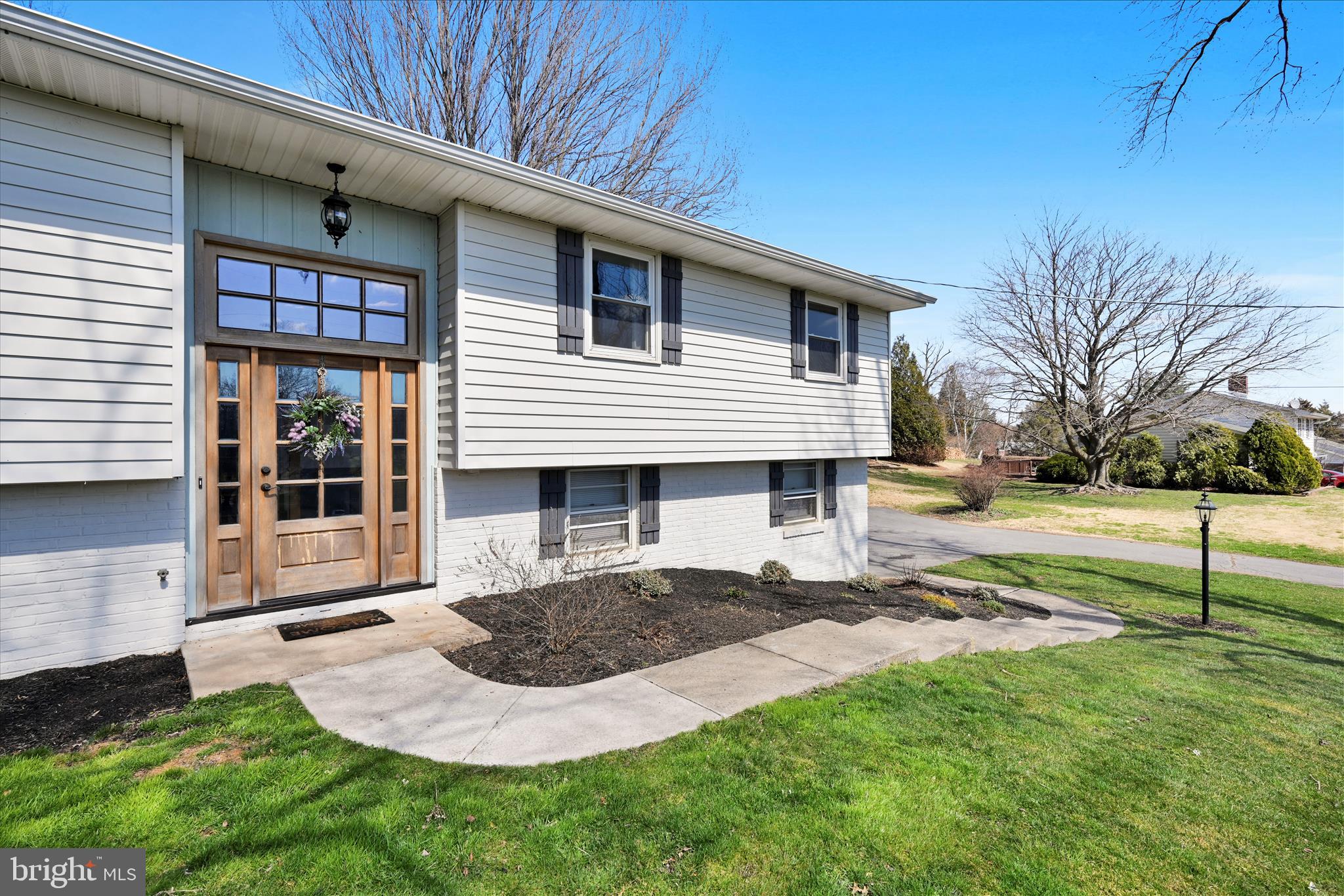 668 Scotland Road Quarryville, PA 17566 - Photo 7 of 41 a front view of a house with a yard