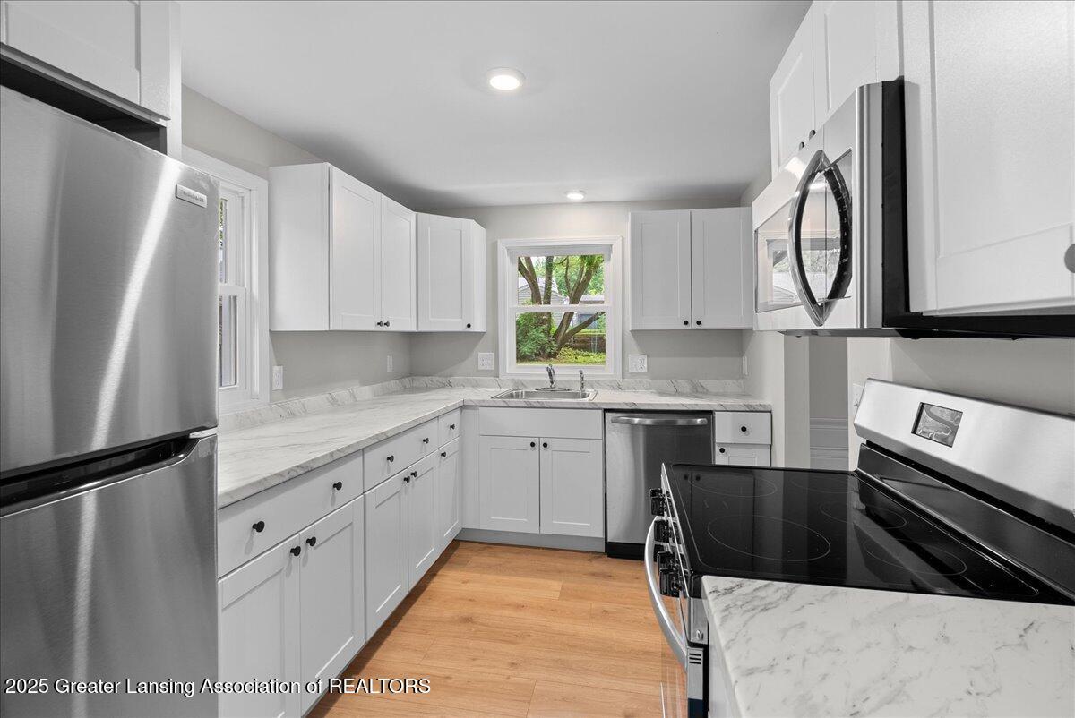 204 East Cavanaugh Road Lansing, MI 48910 - Photo 13 of 30 16-Media Jett - 09