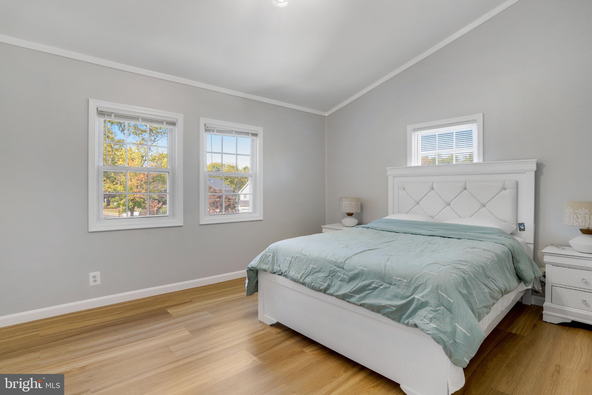 6908 Barrett Road Falls Church, VA 22042 - Photo 17 of 44 Bright and airy bedroom with modern charm.