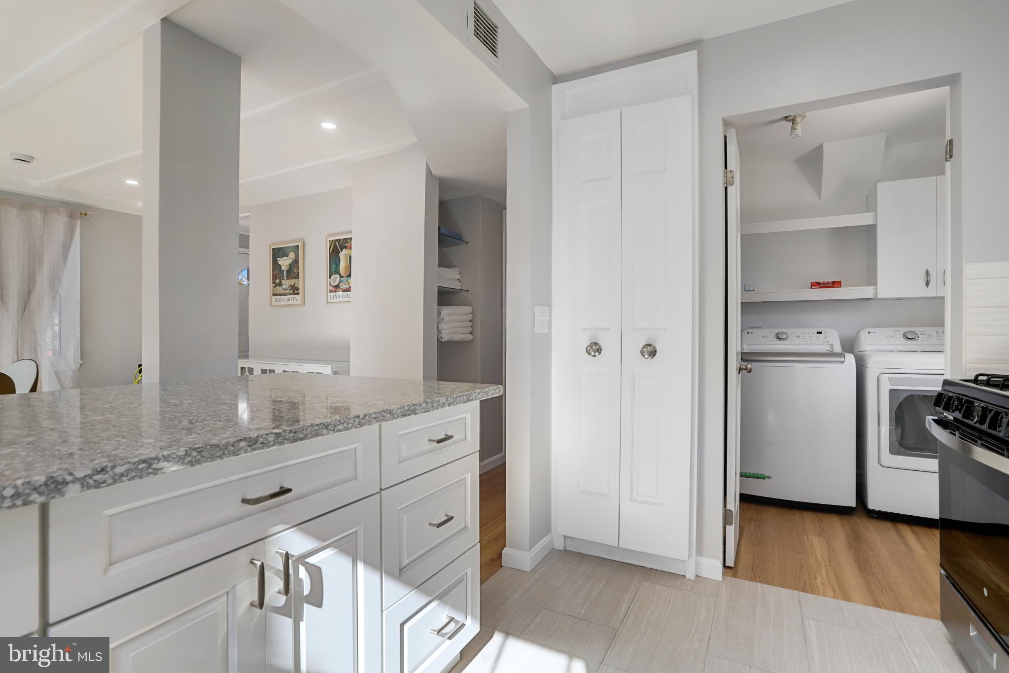 6908 Barrett Road Falls Church, VA 22042 - Photo 21 of 44 Bright and airy laundry nook with modern finishes.