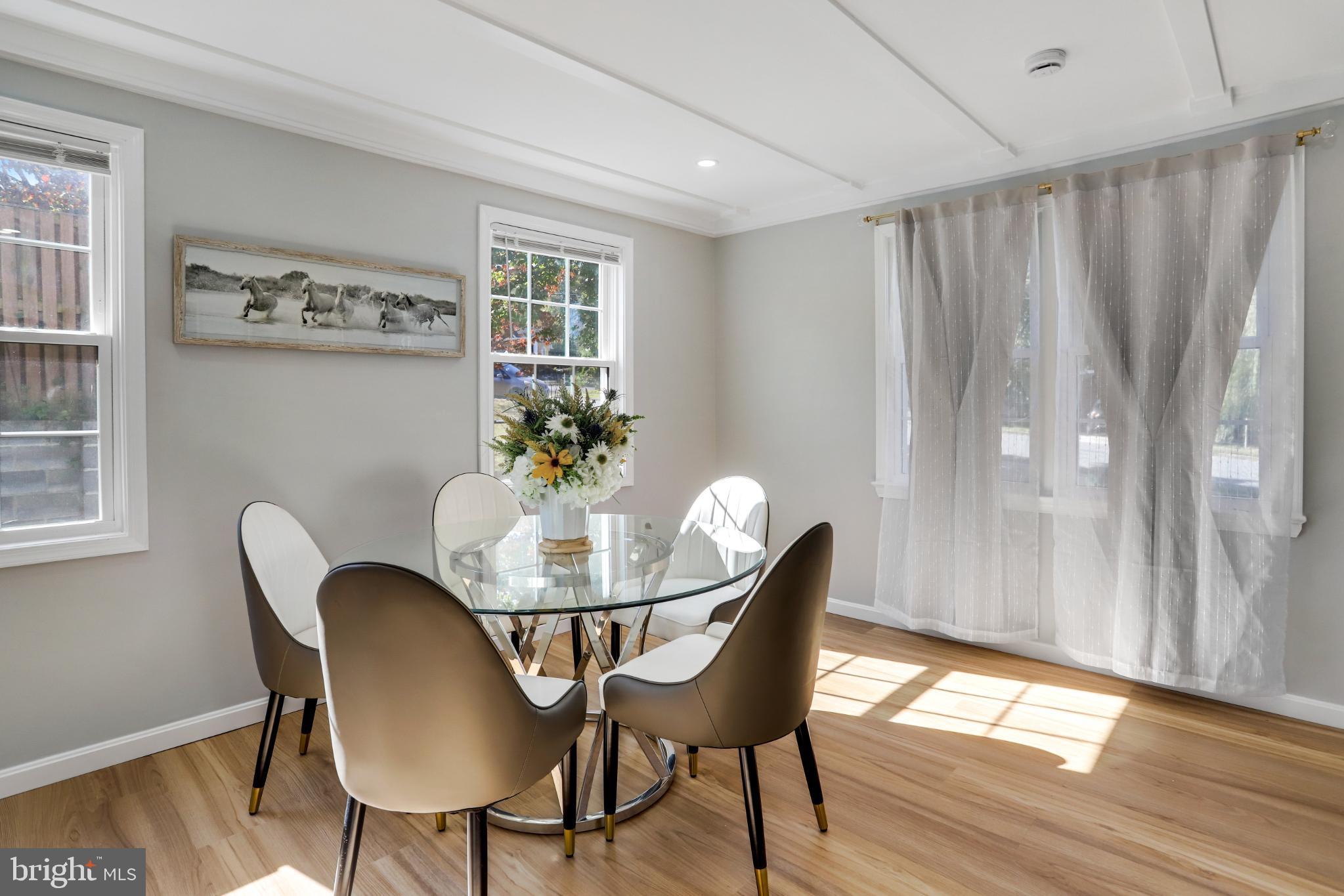 6908 Barrett Road Falls Church, VA 22042 - Photo 24 of 44 Bright and airy dining space with modern flair.
