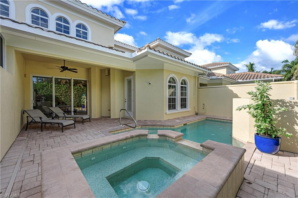 4819 West Blvd Court, Unit 103 Naples, FL 34103 - Photo 17 of 19 a view of a house with sitting area
