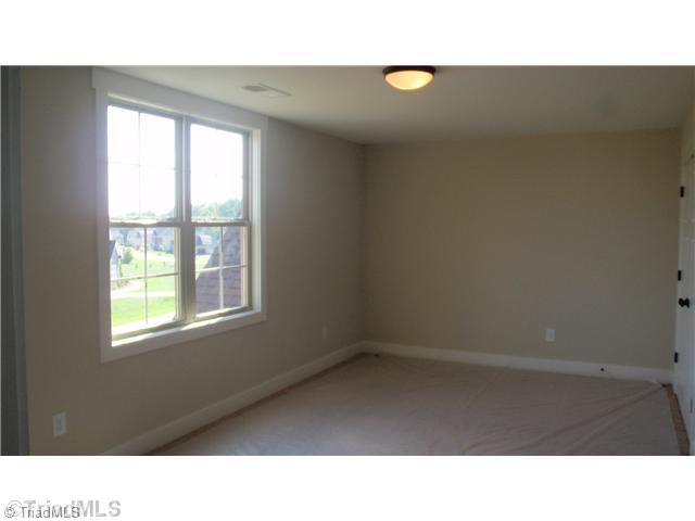7793 Sutter Road Greensboro, NC 27455 - Photo 11 of 16 2nd Bedroom.