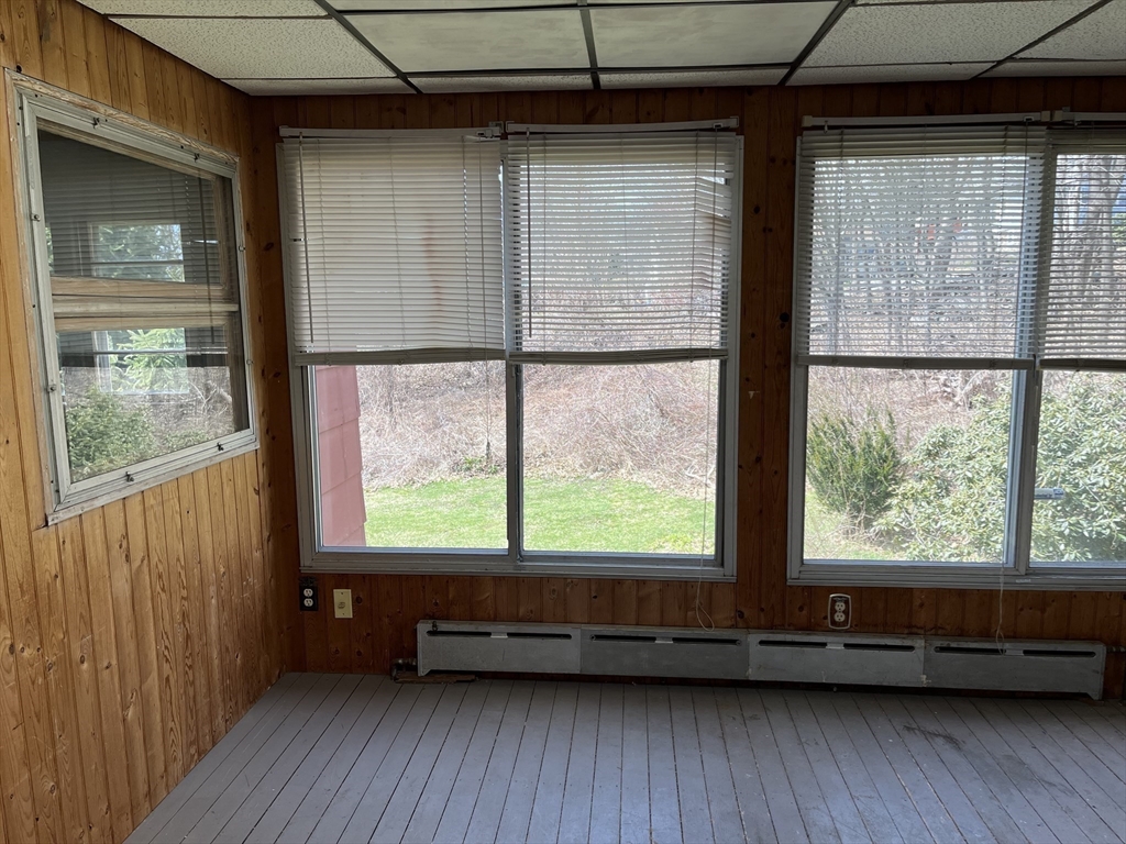 10 Renfrew Street Worcester, MA 01604 - Photo 12 of 25 a view of a room with wooden floor and a window