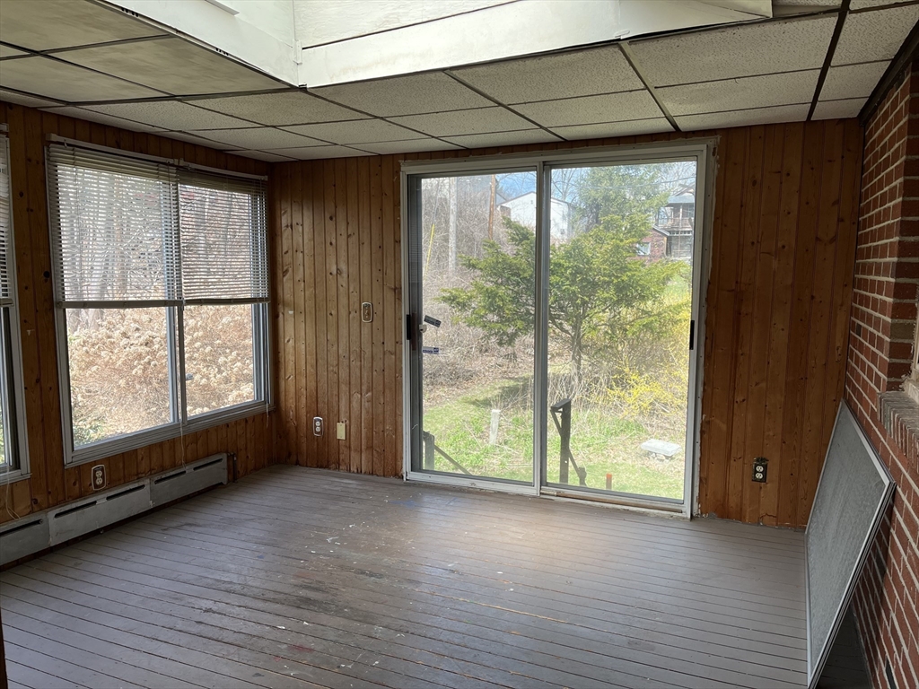10 Renfrew Street Worcester, MA 01604 - Photo 13 of 25 a view of room with window and hardwood floor
