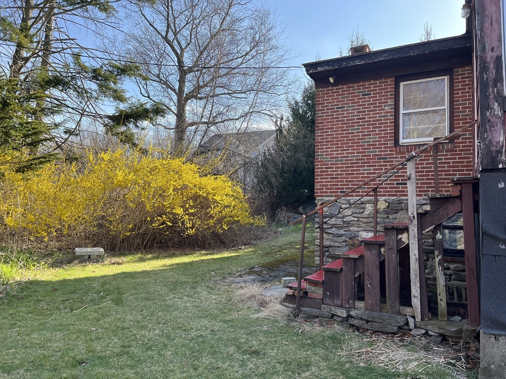 10 Renfrew Street Worcester, MA 01604 - Photo 21 of 25 a view of a house with a yard