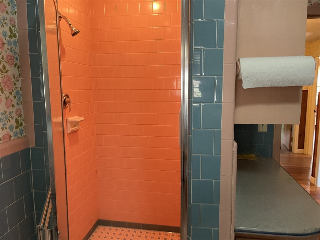 10 Renfrew Street Worcester, MA 01604 - Photo 7 of 25 a bathroom with a shower