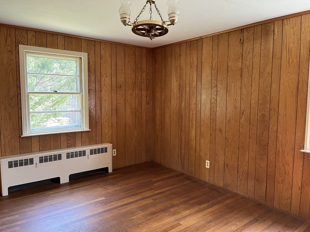 10 Renfrew Street Worcester, MA 01604 - Photo 9 of 25 a view of a room with wooden floor and windows