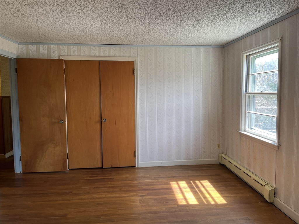 10 Renfrew Street Worcester, MA 01604 - Photo 10 of 25 an empty room with window