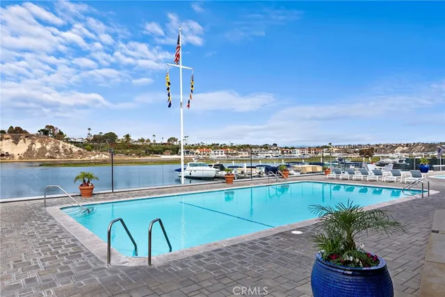 a view of a swimming pool and lake view