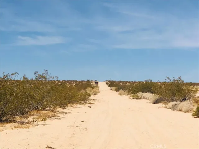 a view of ocean and mountain