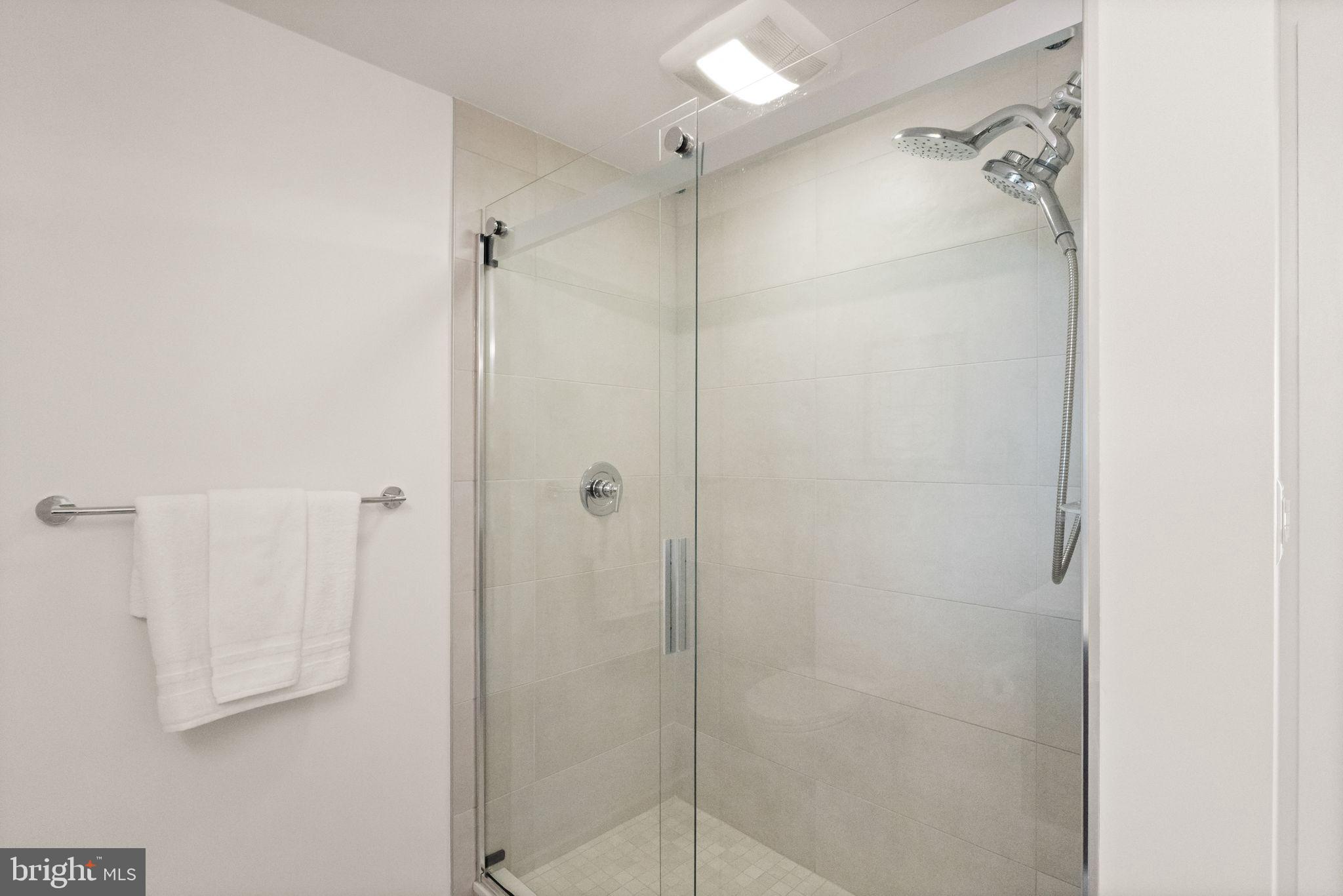 37 L Street Southeast, Unit 1102 Washington, DC 20003 - Photo 15 of 38 a bathroom with a shower