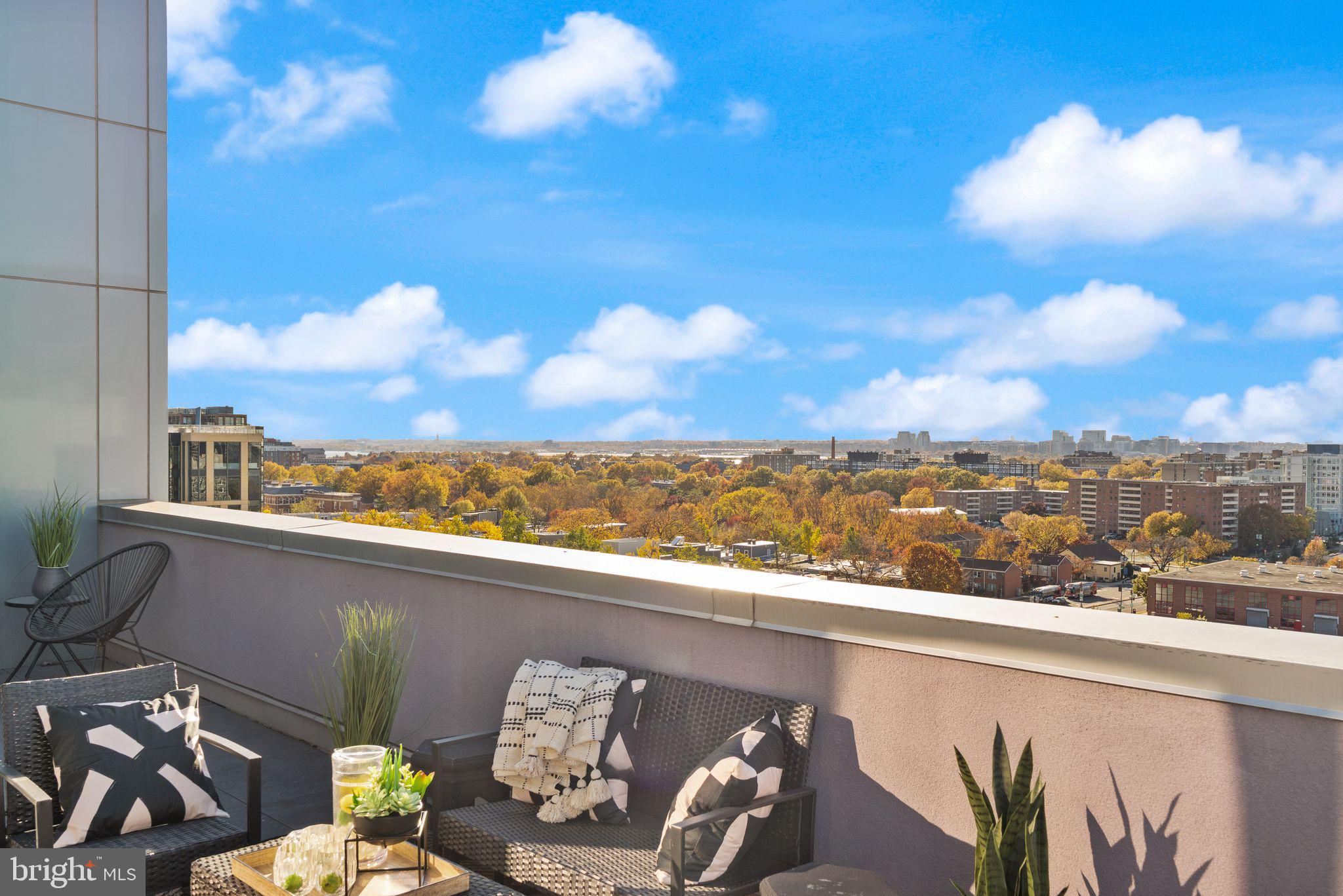 37 L Street Southeast, Unit 1102 Washington, DC 20003 - Photo 24 of 38 a view of a terrace with furniture