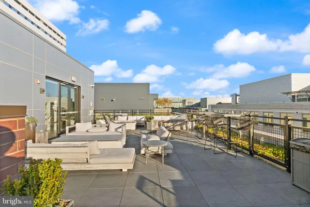 a view of a terrace with furniture