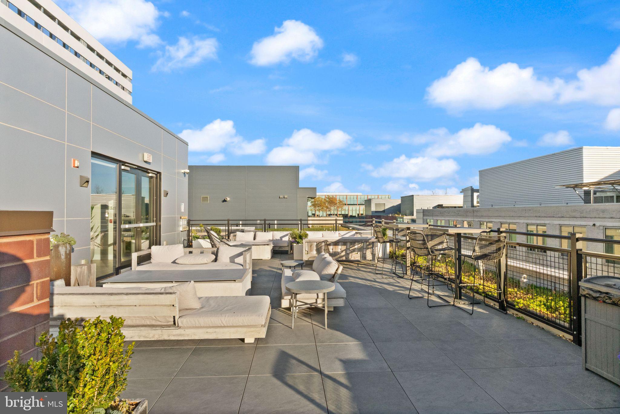 37 L Street Southeast, Unit 1102 Washington, DC 20003 - Photo 30 of 38 a view of a terrace with furniture