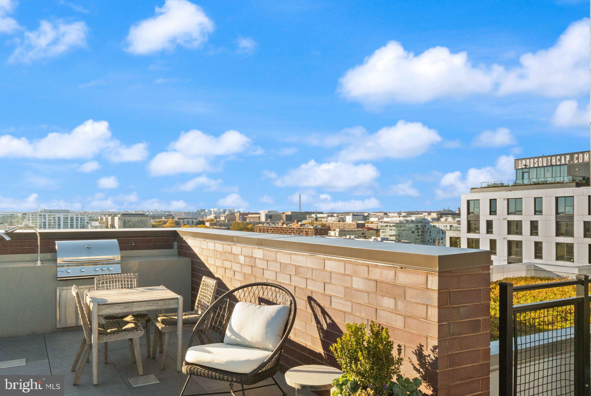 37 L Street Southeast, Unit 1102 Washington, DC 20003 - Photo 32 of 38 a view of a balcony with chairs