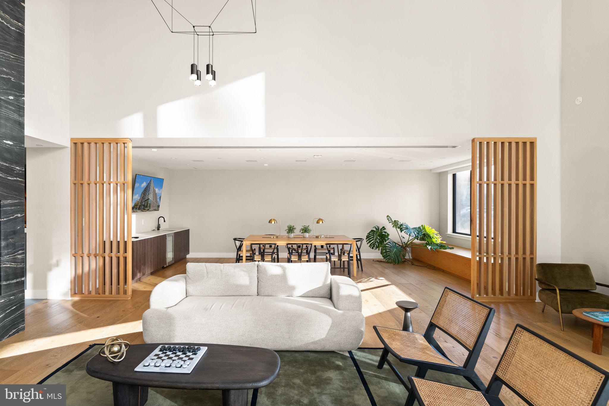 37 L Street Southeast, Unit 1102 Washington, DC 20003 - Photo 36 of 38 a living room with furniture and a table